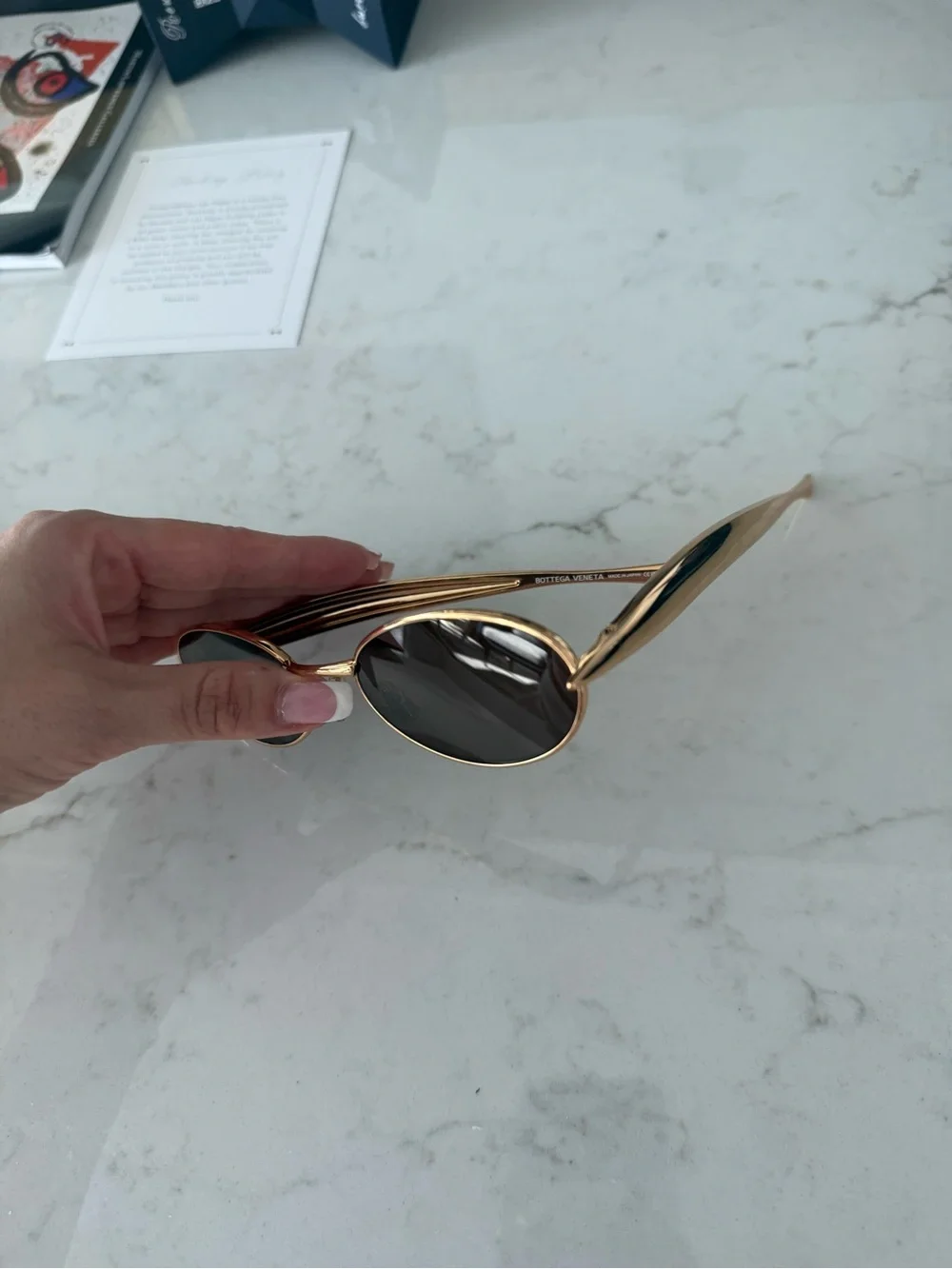 Bottega Veneta Gold Sardine Oval Sunglasses with Black Lenses